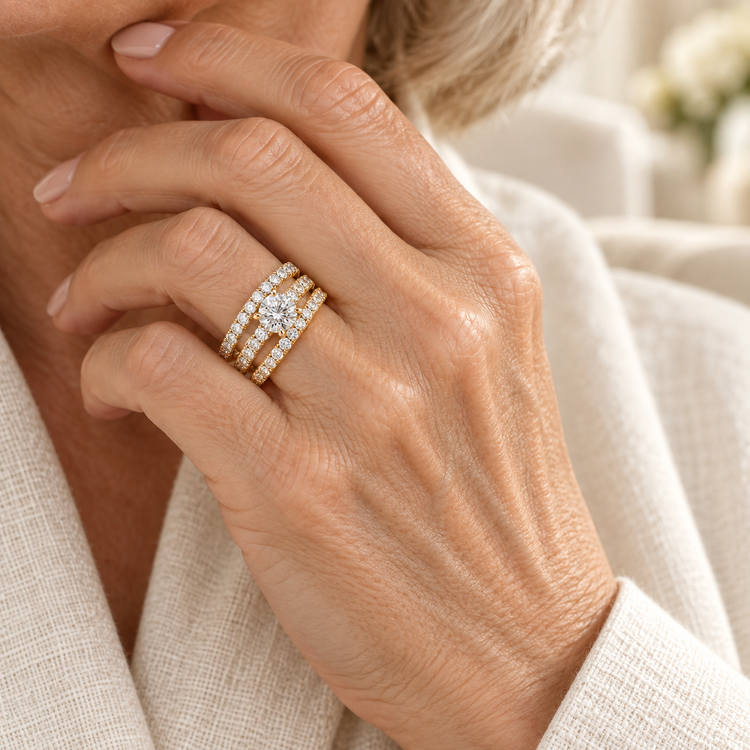 Éclat pavé ring stack worn by a mature woman