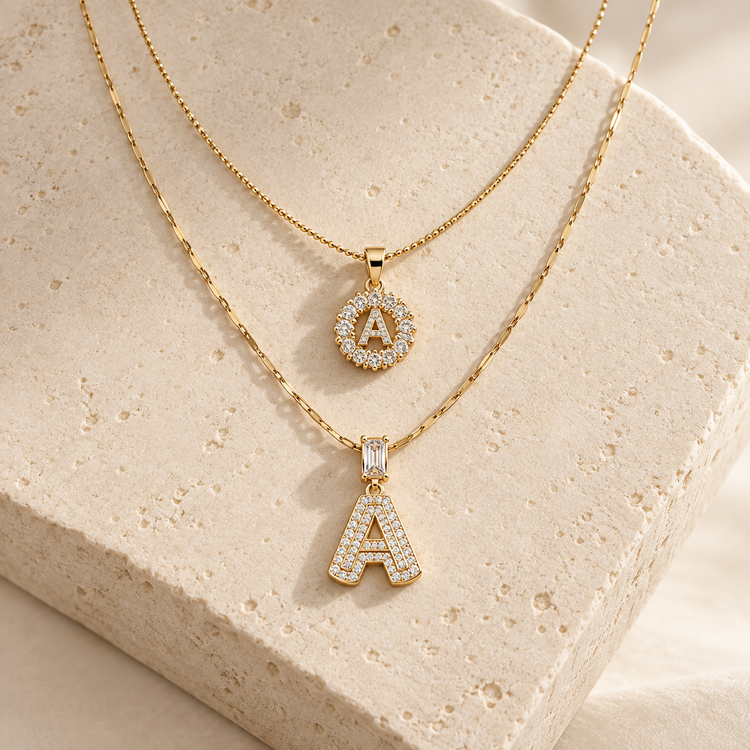 Initiale layered pavé necklace duo shown with letter A